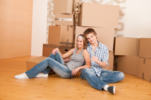 Professional flat removals planning in Stamfordhill with boxes and moving equipment